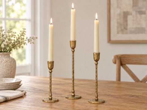 Antique Brass Candlestick Holder Set in a warm home setting. AI-styled product image.